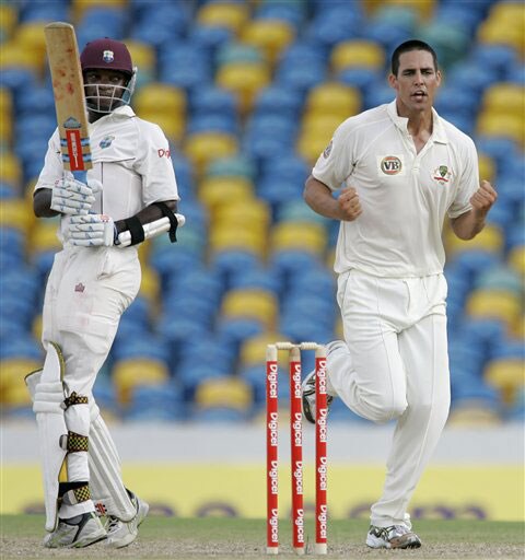 Australia's left-arm pacer Mitchell Johnson celebrates the dismissal of West Indies' Fidel Edwards who was caught out by captain Ricky Ponting for one run, to end the first innings on the second day of their third and final Test at Kensington Oval in Bridgetown, Barbados on June 13, 2008. Day 2: Aus vs WI, 3rd Test